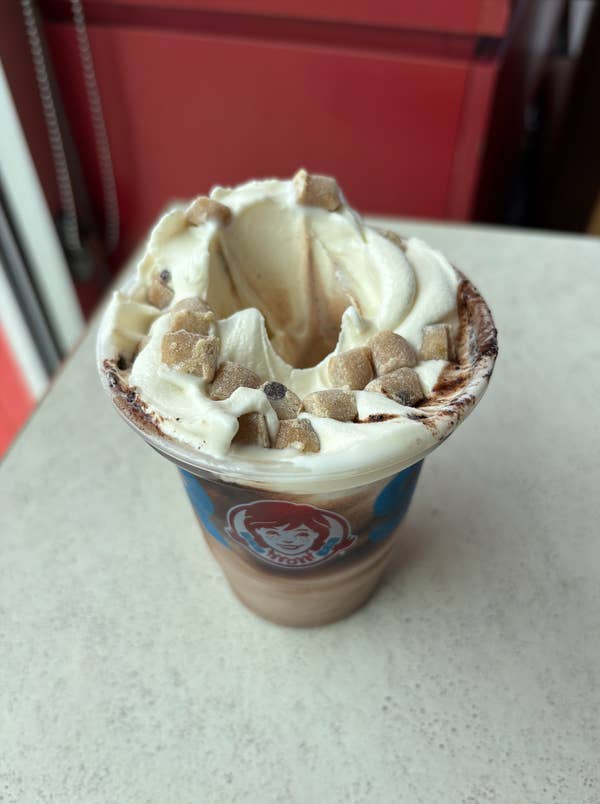 Wendy's Cookie Dough Frosty Fusion with vanilla soft serve and cookie dough pieces
